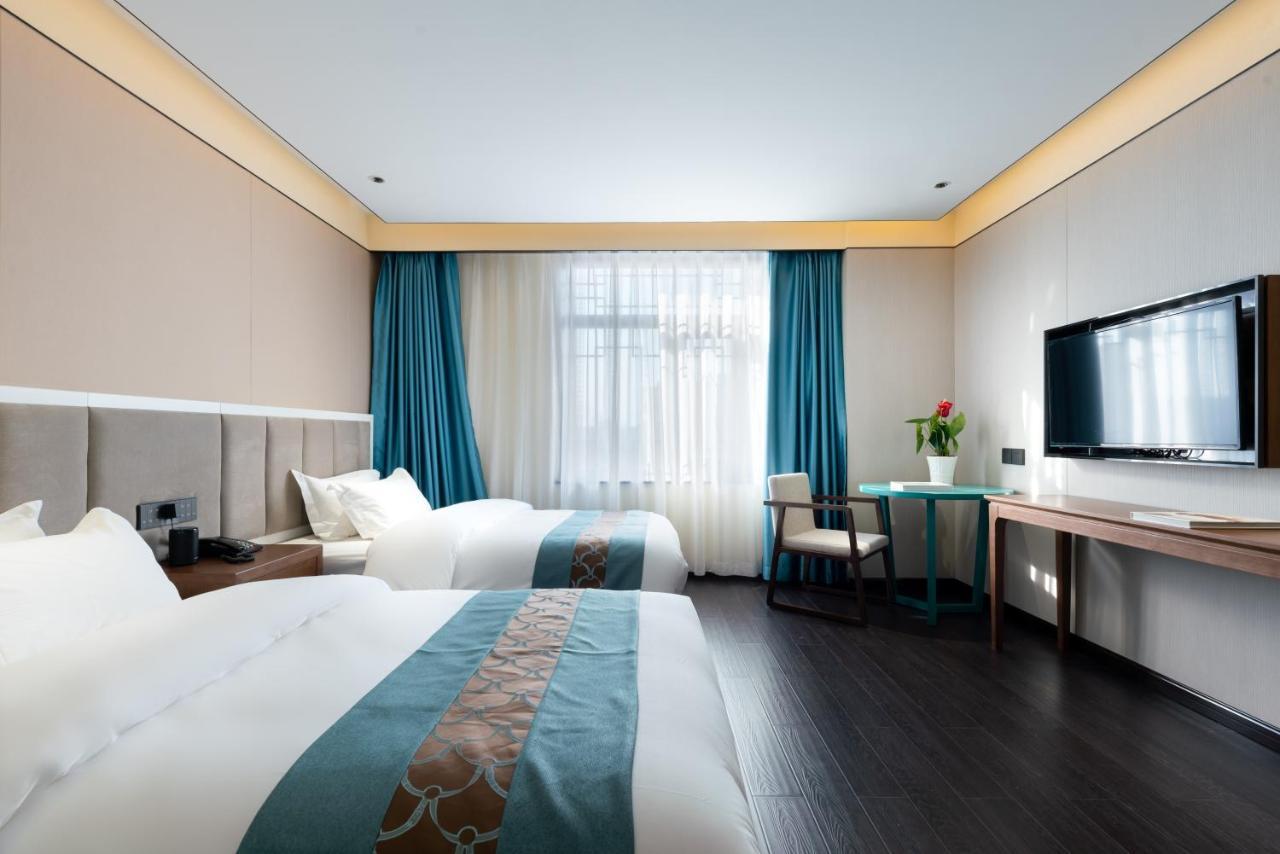 Beijing Tangfu Hotel - Located In The City Center Adjacent To The Subway Station Close To Nanluoguxiang Gulou Lama Temple Tiananmen Square Forbidden City Temple Of Heaven Providing Laundry Car Rental And Ticketing Services Extérieur photo